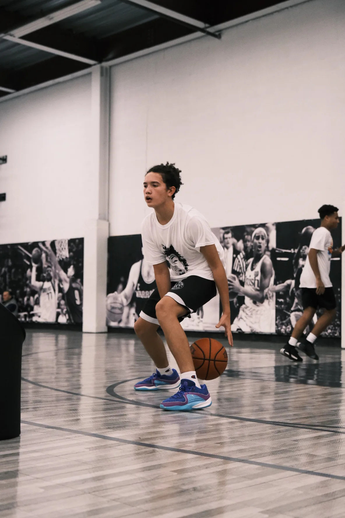 Young player focused on dribble drill at Benjamin Buckets Training
