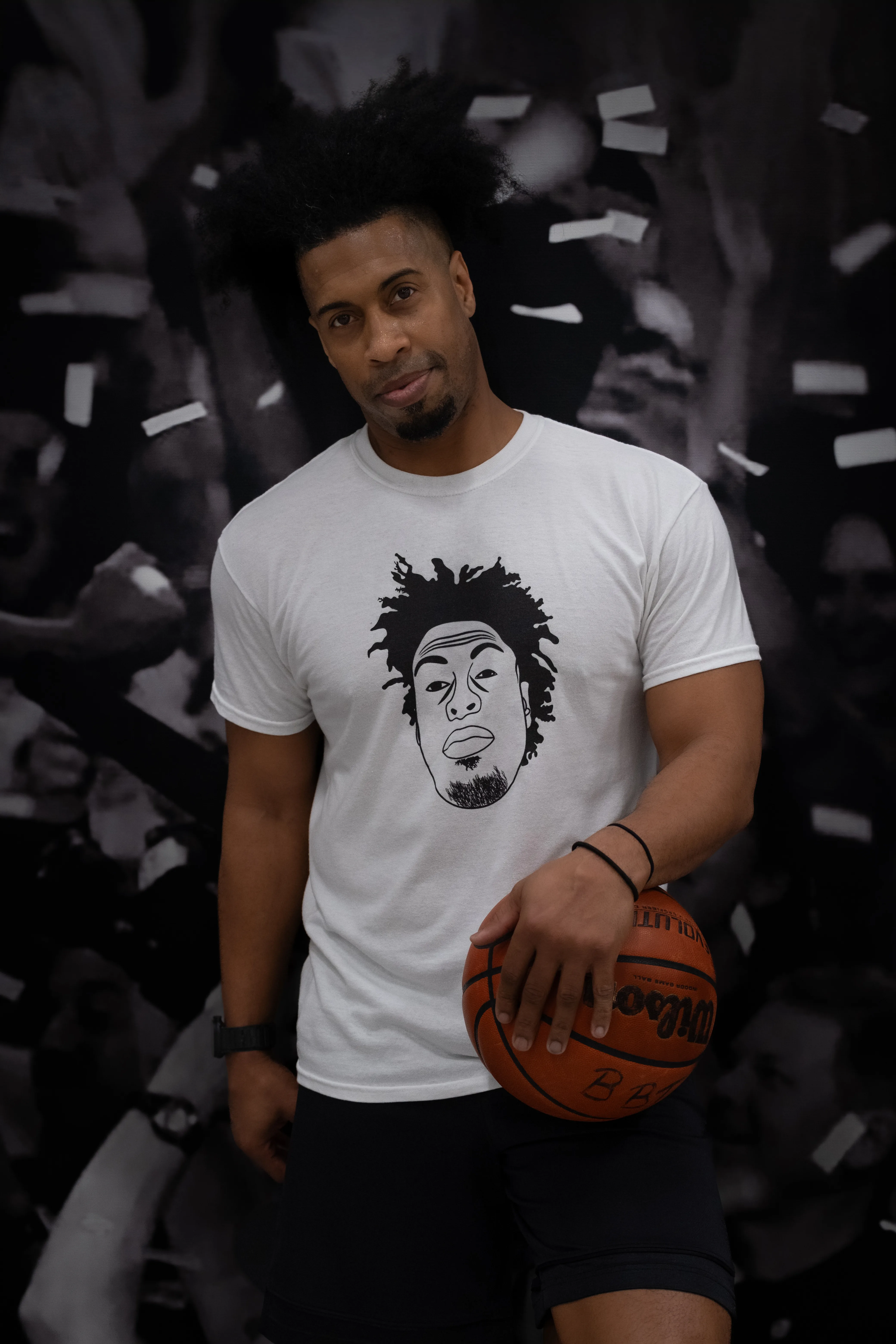 Ben Allen, founder and head trainer of Benjamin Buckets Training, standing with a basketball